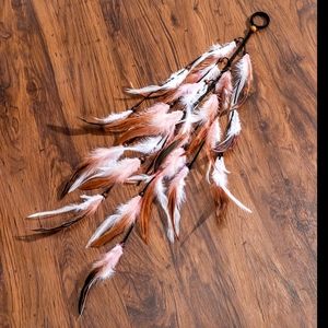 Beautiful Pink Bohemian Featherd Ponytail .